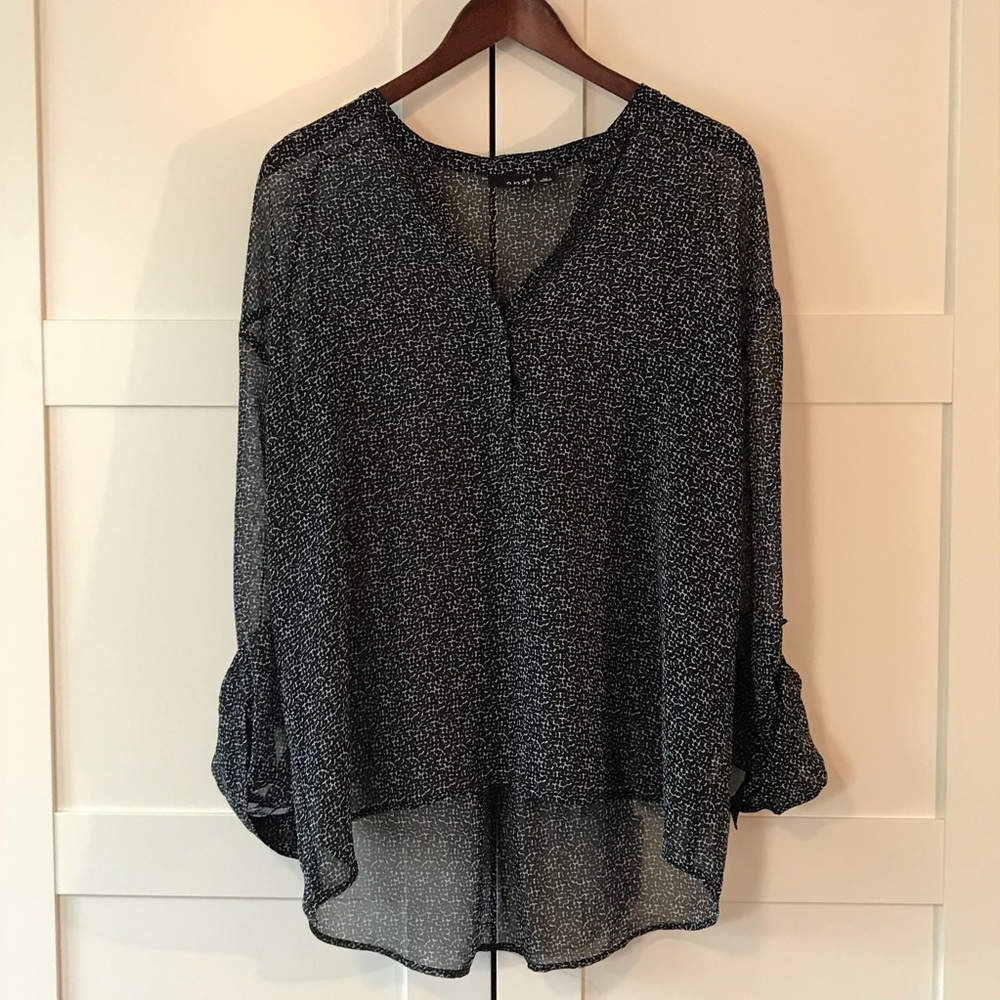 Black blouse with white dots